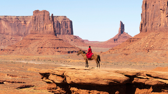 lady in red monument valley usa
